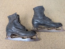 Pair Of Vintage Leather Ice