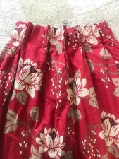 Pair of red curtains made by
