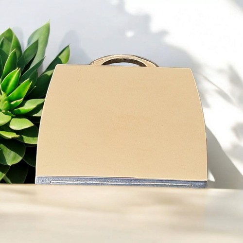 Here and now handbag shape - now,