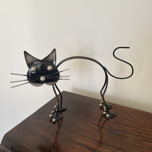Metal cat ornament indoors - ornament,