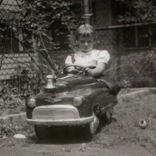 C1950s girl fire - girl, pedal