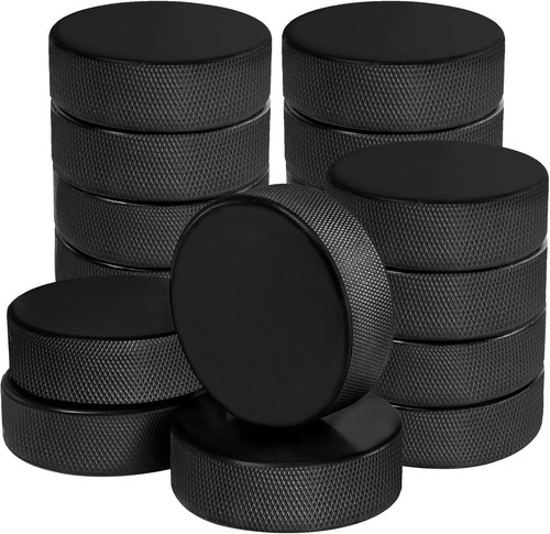 Pack ice hockey pucks with - ice,
