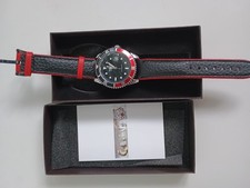 watch winner red and black