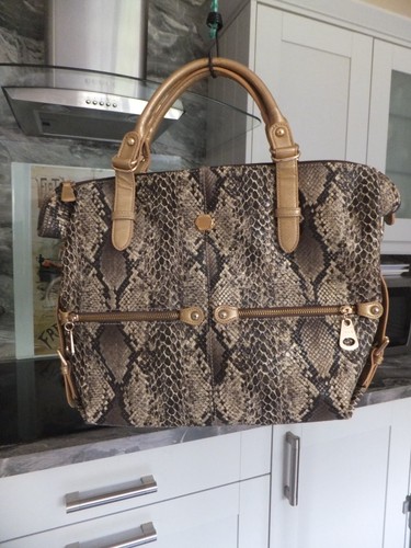 Ladies boo snakeskin style