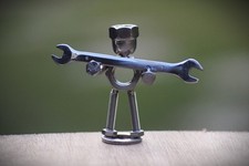 Mechanic Holding A Spanner