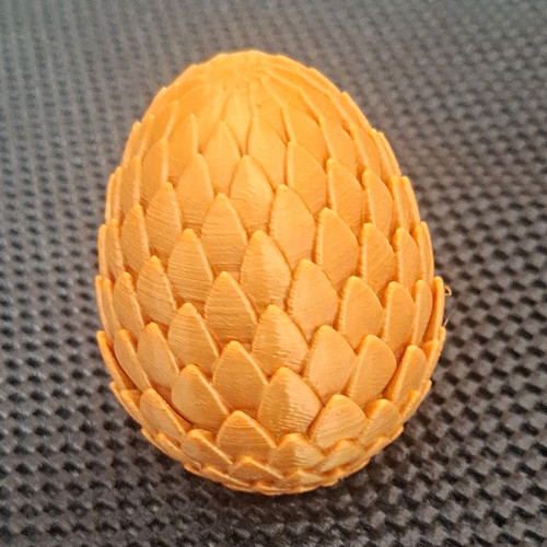 Orange textured plastic dragon - textured,