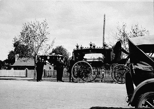 Coffin being placed - coffin, in