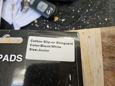 Sandee Stretch Shin Pads Junior. Black and White. New and Unused.