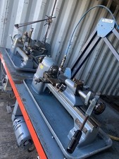 Two Schaublin 70 lathes on steel bench with some accessories