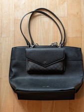 Slightly used Nine West black handbag with releasable chain purse