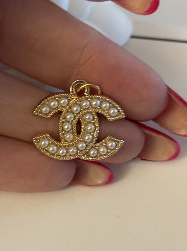 Chanel paris gold pearl - gold, cc