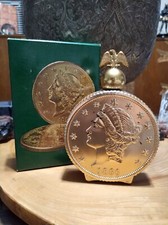 Vintage Avon 20 dollar gold