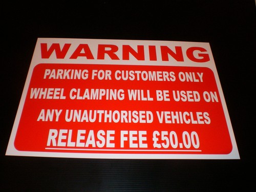 Parking customers only wheel - customers,
