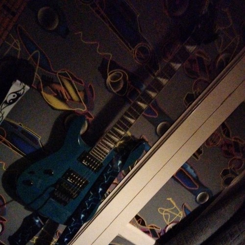 Left handed electric guitar - left,