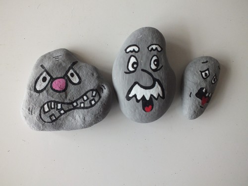 Funny face rock art - face, hand