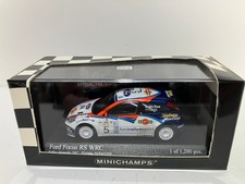 MINICHAMPS 1.43 Ford Focus RS WRC. Winners Colin McRae/Grist. 430 028905