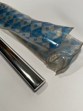 NOS CHROME TRIM LEFT FRONT