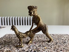 Indian Hindu God With Chicken