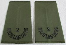 Pair of British Army:"2nd HIGHLANDERS SLIP-ON SHOULDER TITLES" (Unissued, 1990s)
