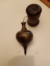 ANTIQUE LARGE BRASS PLUMB BOB WITH STRING AND BOBBIN VERY HEAVY