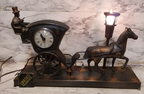 Vtg united clock - united, #701