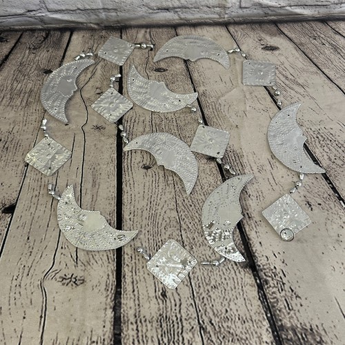 Aluminium stamped sitting - aluminium, moon