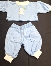 By Michael De Leon. Blue. (Pre-owned).