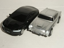 9V MICRO Scalextric - Pair of James Bond Aston Martin DB5 and Jaguar - Exc. Cdn.