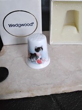 Wedgwood cats playing with