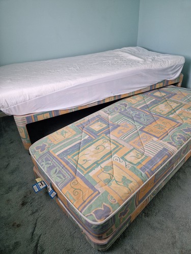 Single trundle bed with - bed,