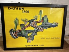 A Vintage Framed Nissan Datsun 1800 Motorcar Dealership Advertising Poster