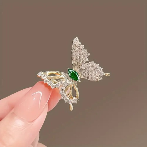 Butterfly shaped brooch with - shaped,