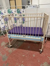 Infant Cot & Mattress/Arjo