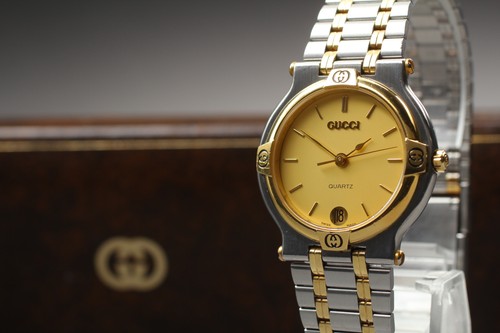 Gucci 9000m gold dial - dial, date
