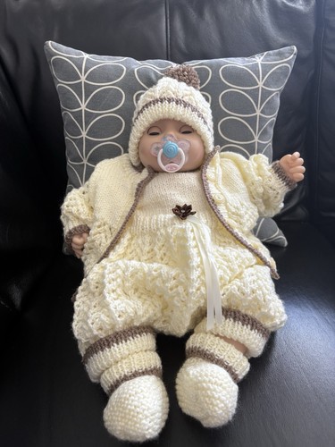 Hand knitted baby cream - hand,