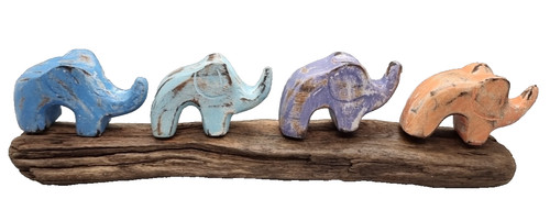 Elephants carving driftwood - elephants,