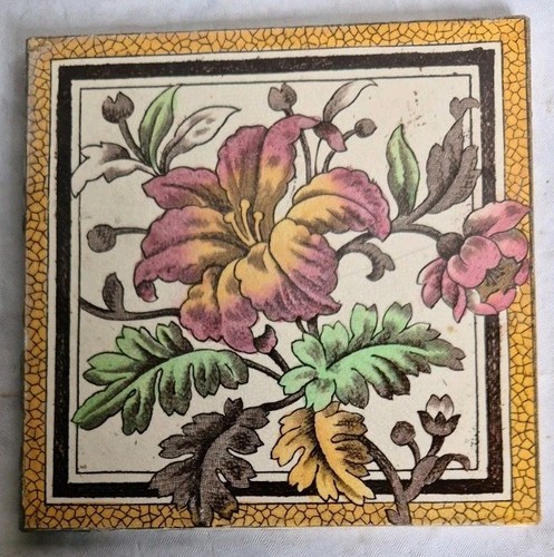 Antique tile lily design