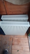 Electric Radiators made by Fischer Future Heat. White with Thermostat Control