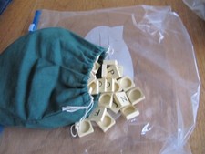 A FULL SET OF SCRABBLE TILES, ROUND BACKS.