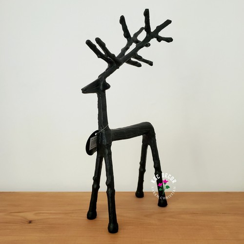 Tall standing black stick - black,
