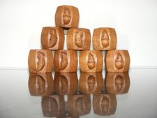 A CLASSIC SET OF EIGHT  ROBERT  MOUSEMAN  THOMPSON OAK NAPKIN RINGS ( CRITTER )