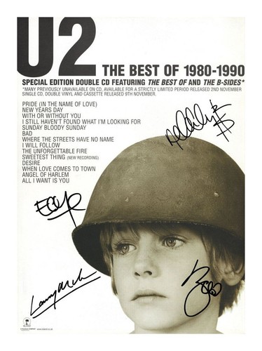 Entire group autographed - u2,