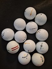 TWELVE VARIETY GOLF BALLS