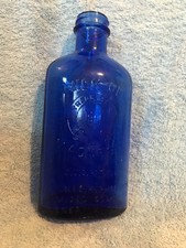 ANTIQUE BLUE GLASS BOTTLE Milk