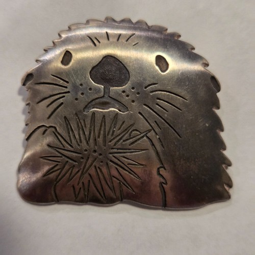 Vintage 1994 sea otter holding - vintage,