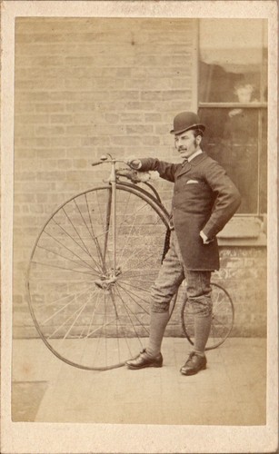 Penny farthing bicycle - farthing, clay