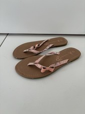 Atmosphere flip flops with bow