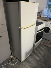 Amika , a fridge freezer, combining both refrigeration and freezing compartment