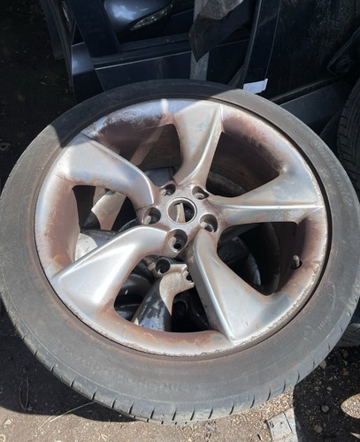 Vauxhall alloy wheel - and, tyres