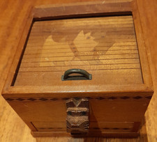 Vintage wooden cigarette box, Scottie dog motifs, roll-back lid, working order